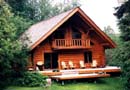 Giesbrecht house- first house built by Wes, 1000 sq.ft. main floor with 3/4 loft, interior log wall and spiral (log) stairs